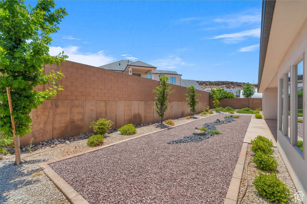 View of fenced backyard