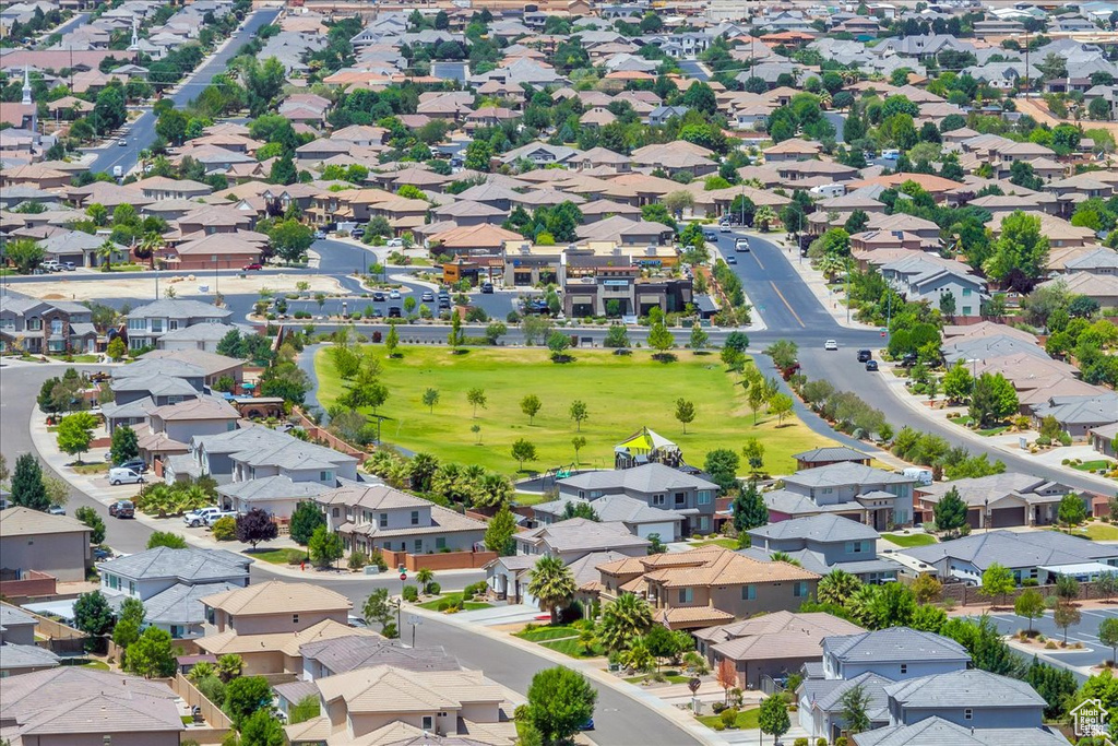 Aerial perspective of suburban area featuring a golf course