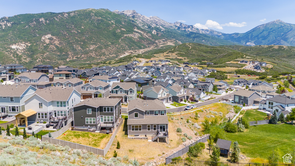 Aerial view of residential area with mountains
