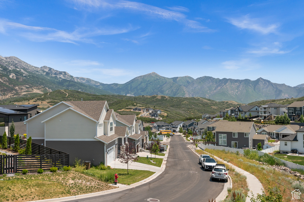 Mountain view featuring nearby suburban area