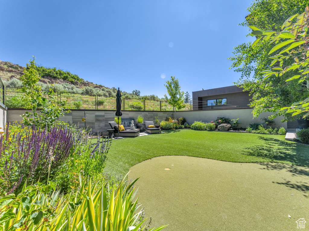 View of fenced backyard