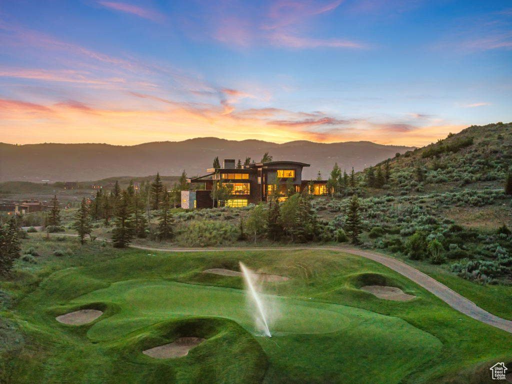 View of home's community featuring a mountain view and golf course view