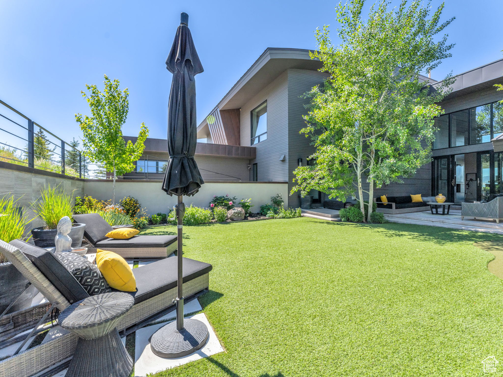 View of yard featuring an outdoor hangout area