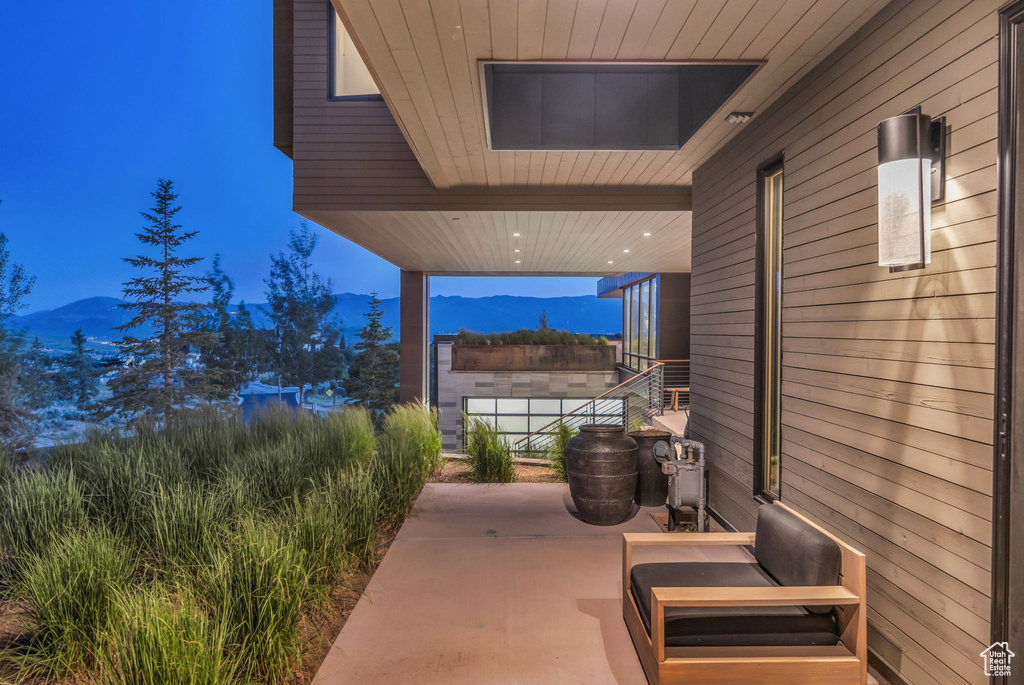 View of patio with a mountain view