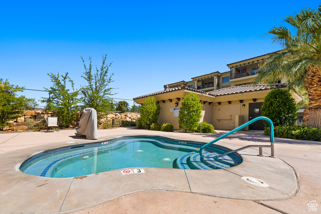 View of swimming pool with a patio area and a pool