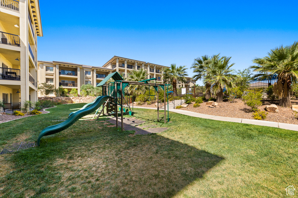 Community playground featuring a yard