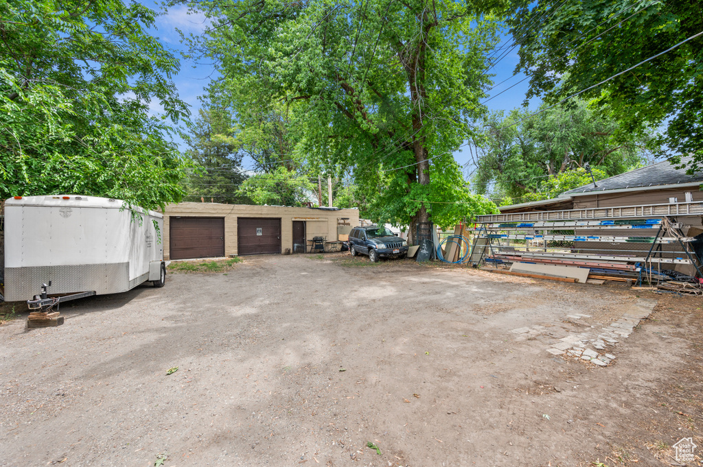 Exterior space featuring a detached garage