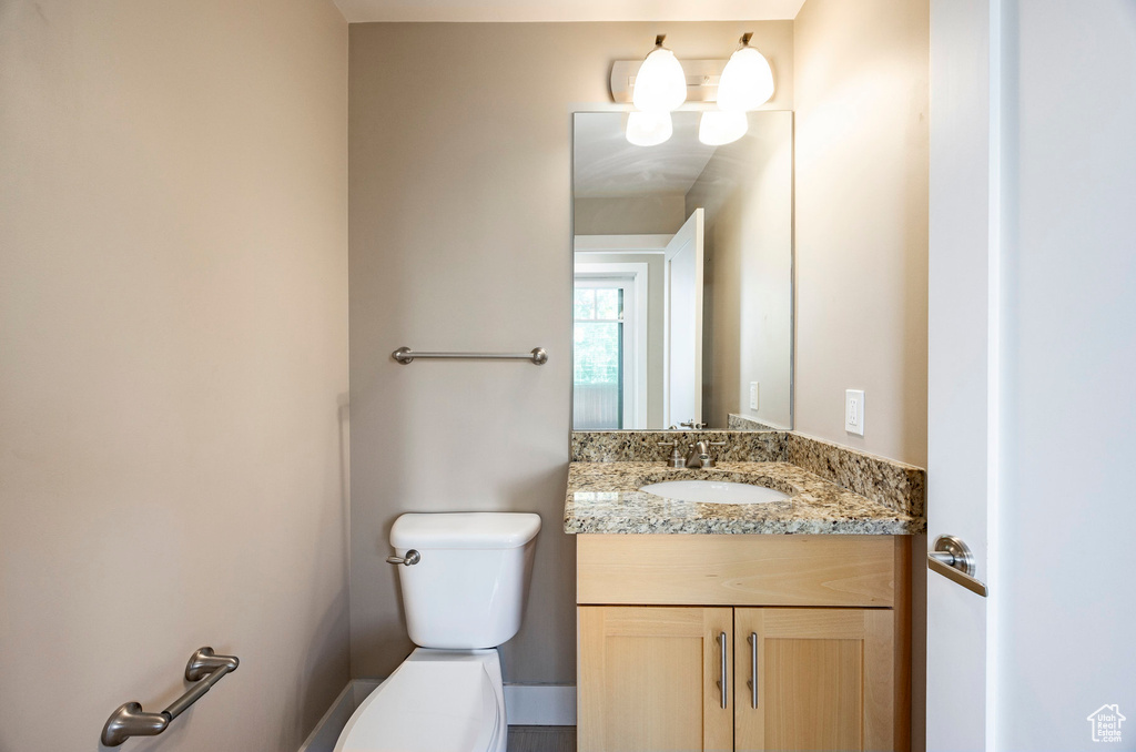 Bathroom with toilet and vanity