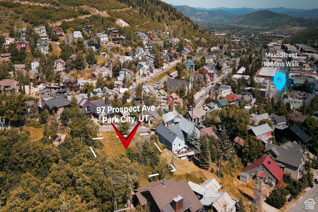 Aerial overview of property's location featuring nearby suburban area