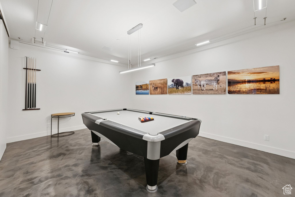 Rec room featuring finished concrete floors and billiards