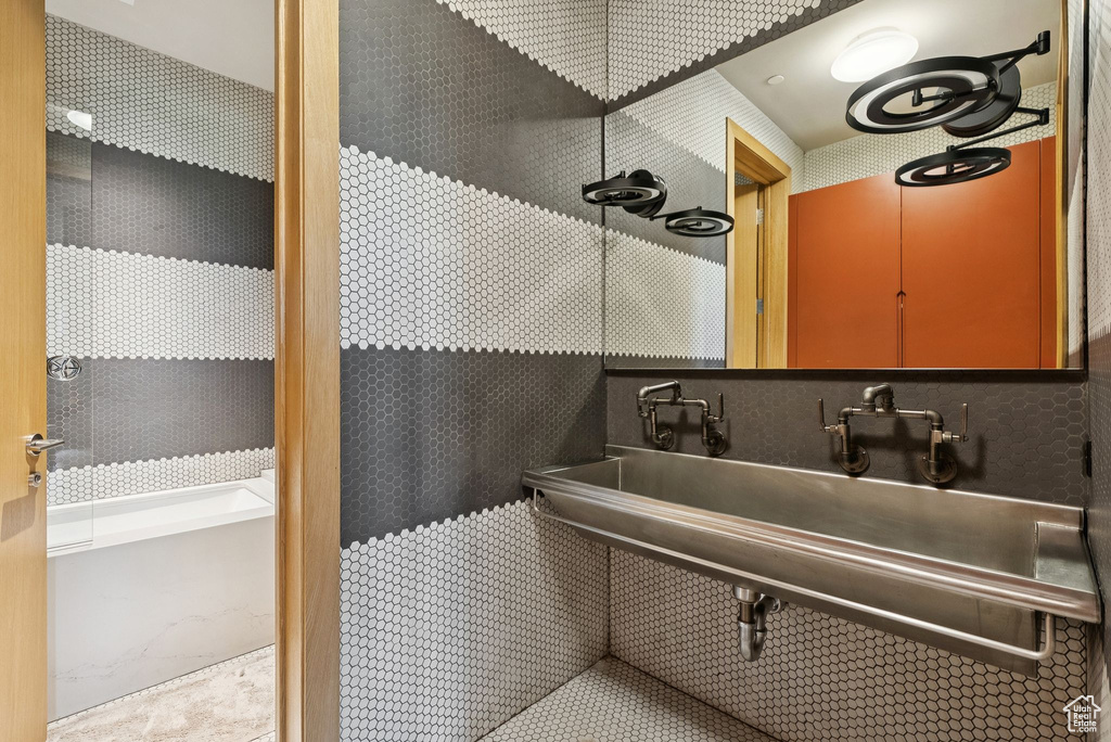 Bathroom with a tub to relax in
