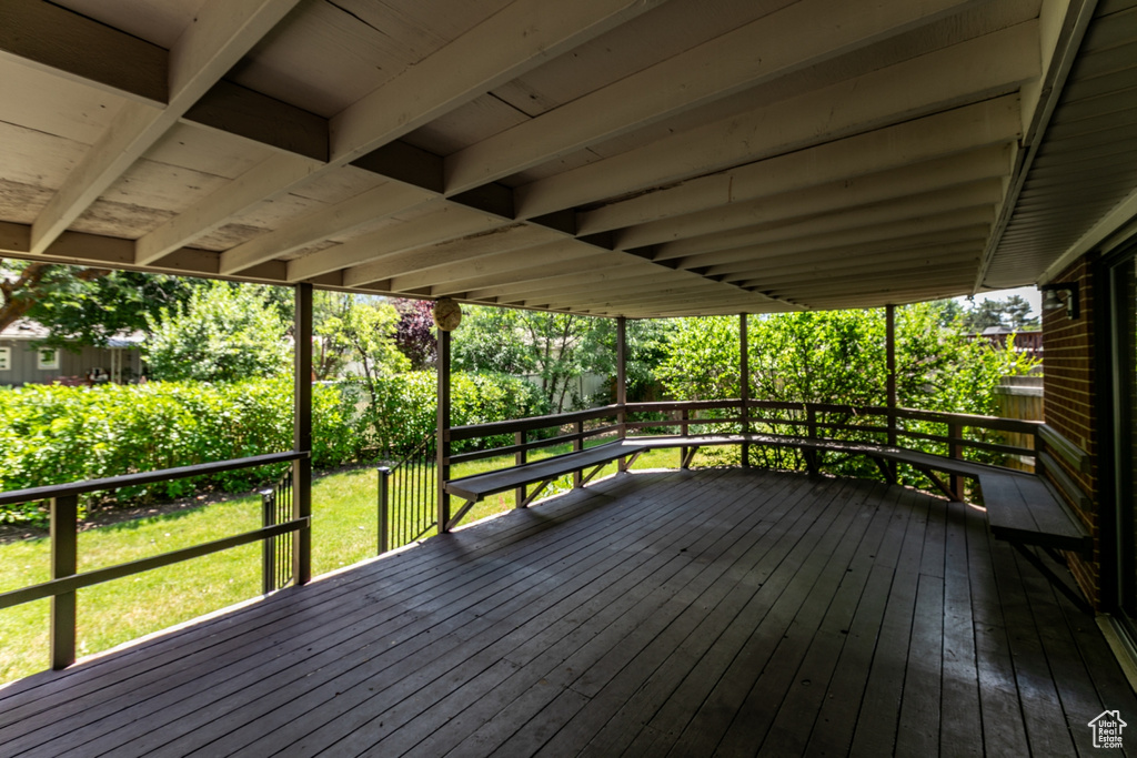 Wooden terrace with a yard