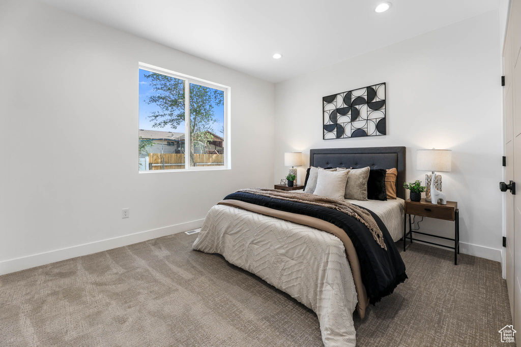 Bedroom with carpet flooring and recessed lighting