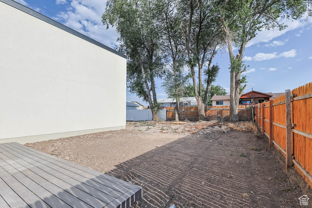 View of fenced backyard