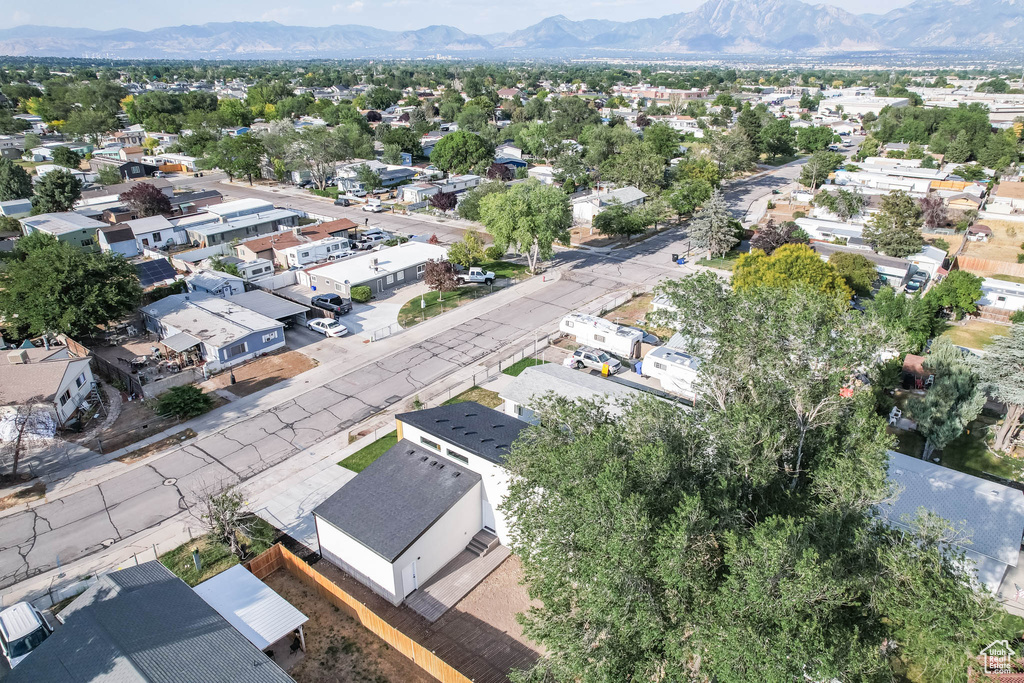 Aerial view of residential area featuring a mountain backdrop