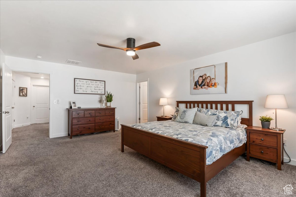 Bedroom featuring carpet flooring and a ceiling fan