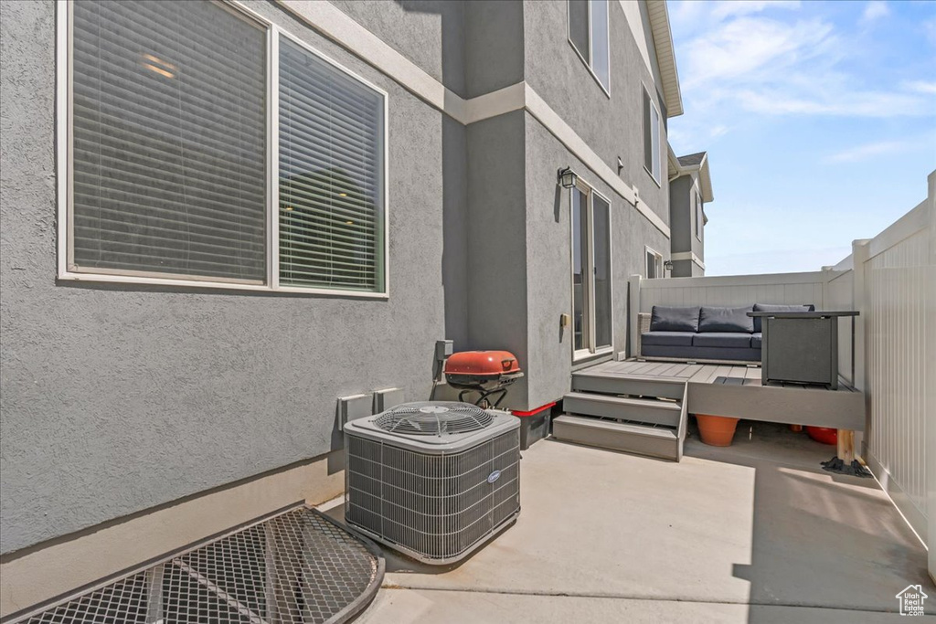 View of patio featuring a wooden deck