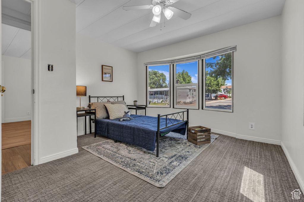 Bedroom with carpet and ceiling fan