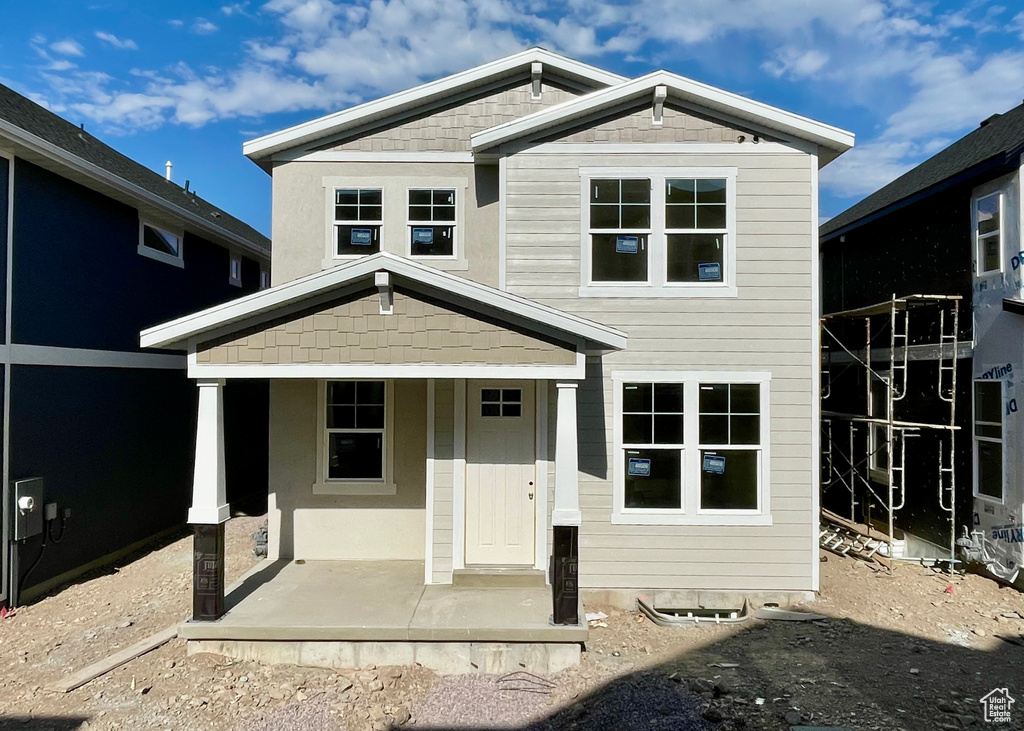 View of front of property featuring a porch