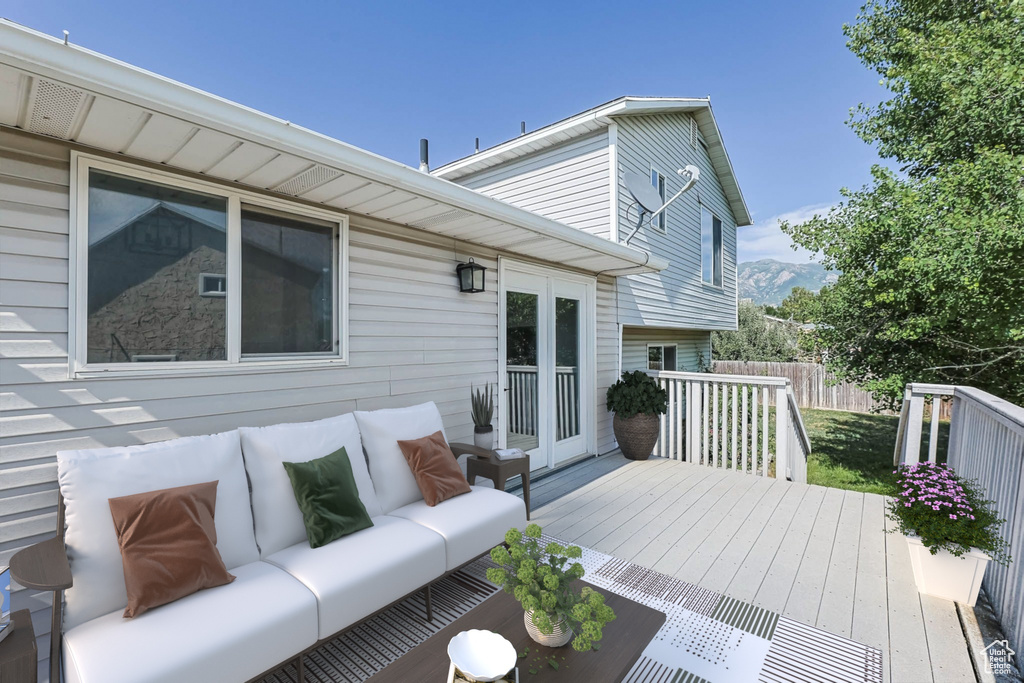Deck with an outdoor living space