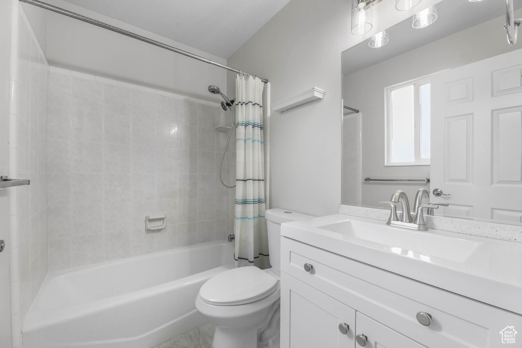 Full bathroom featuring vanity and shower / bath combo