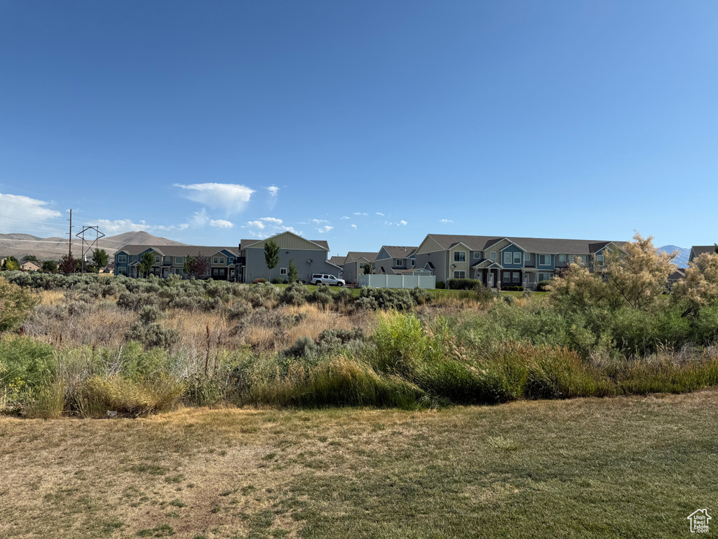 View of yard with a residential view