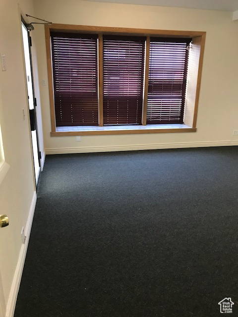 Empty room with baseboards