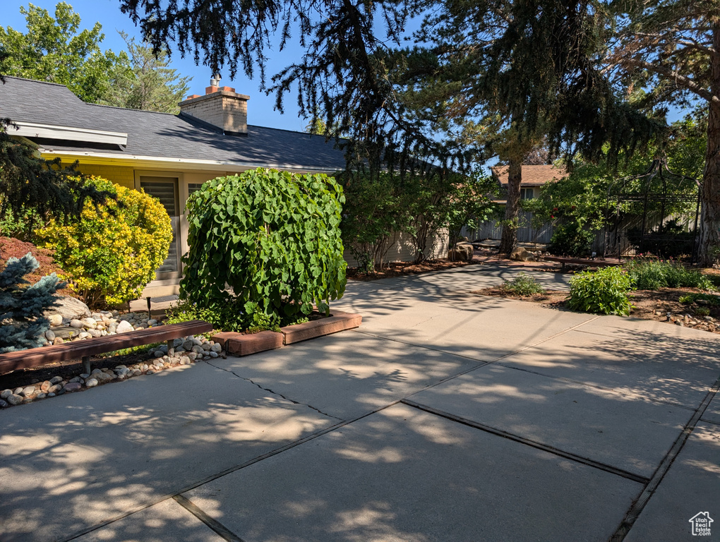 View of side of property featuring a patio area