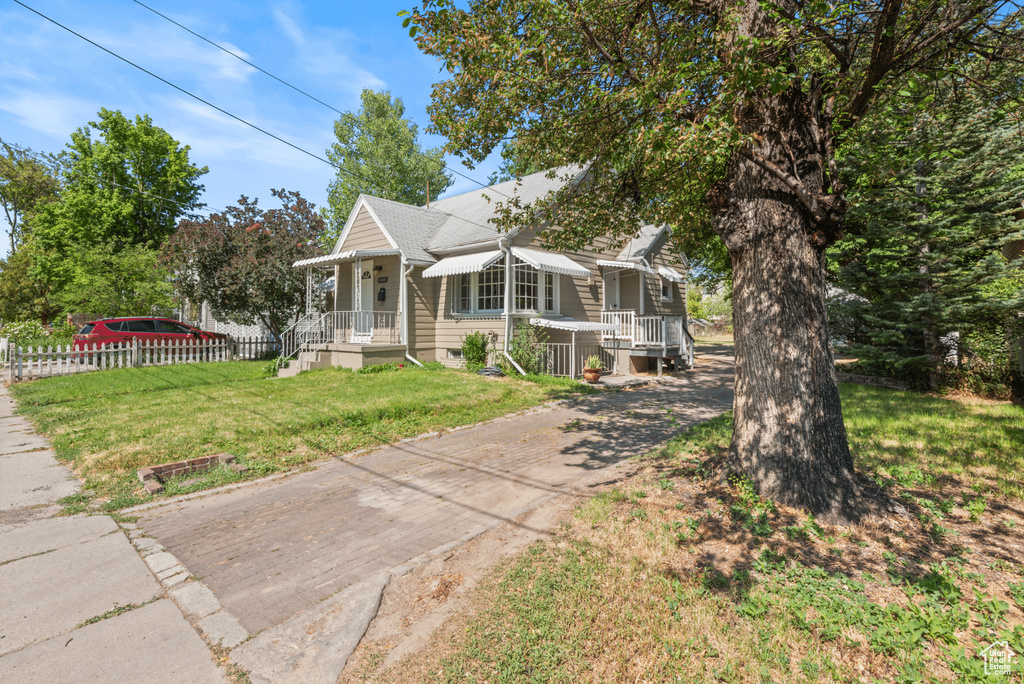 View of front of home featuring crawl space and driveway