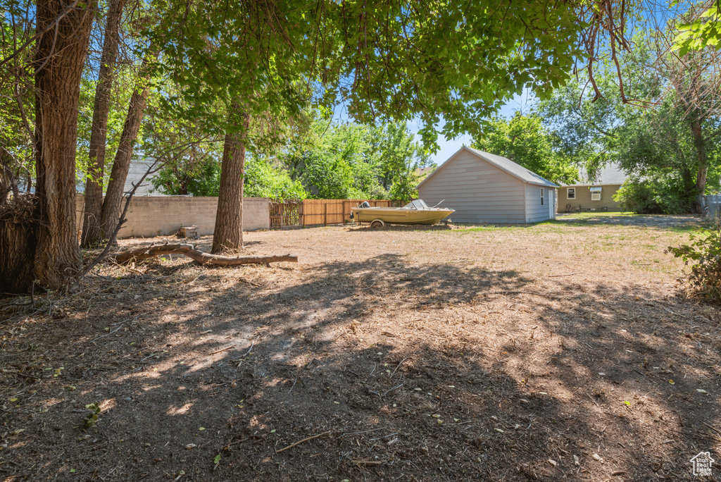 View of fenced backyard