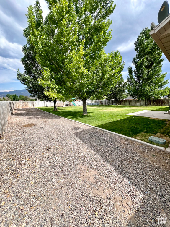 View of yard featuring a playground