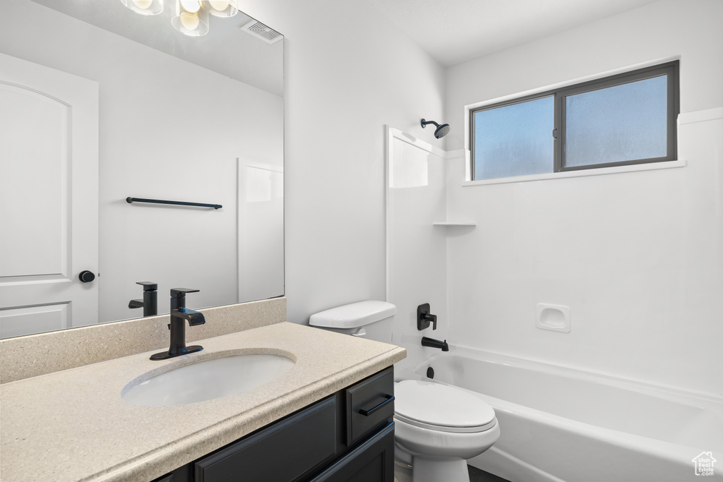 Full bathroom with vanity and shower / bath combination