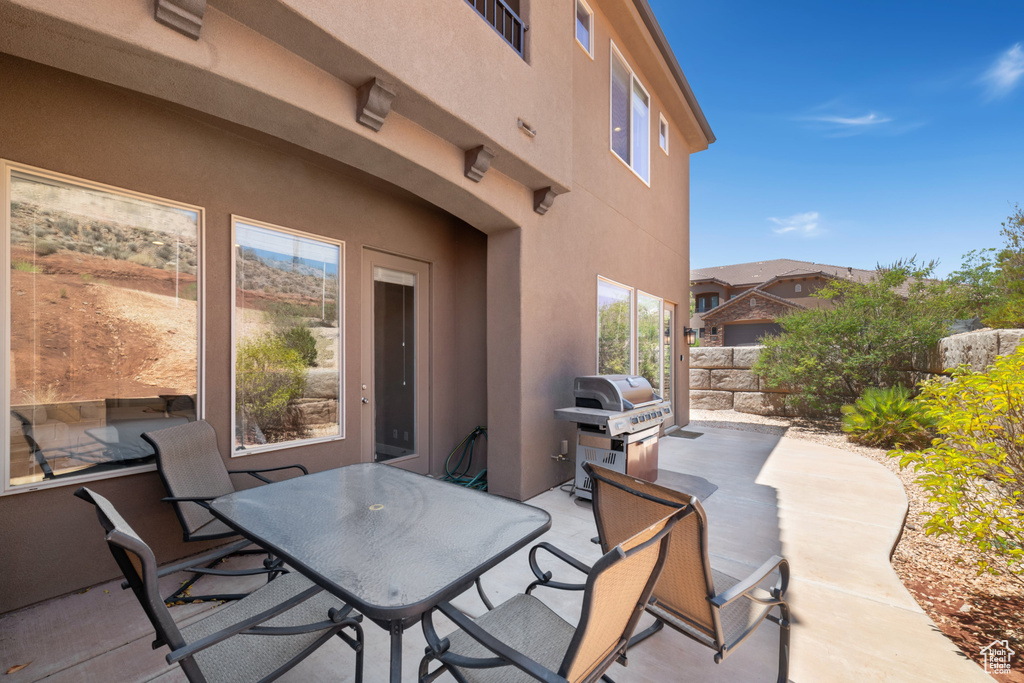 View of patio / terrace featuring area for grilling and outdoor dining space