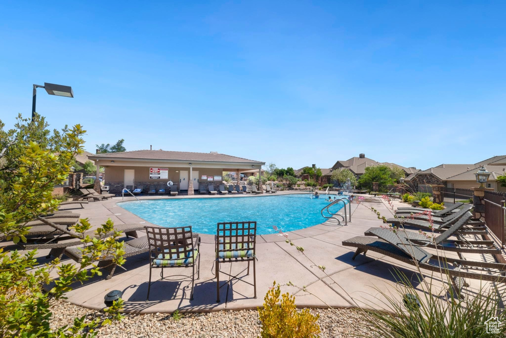 Community pool featuring a patio area