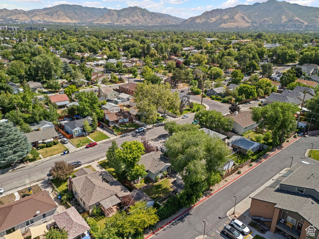 Aerial view of residential area featuring mountains