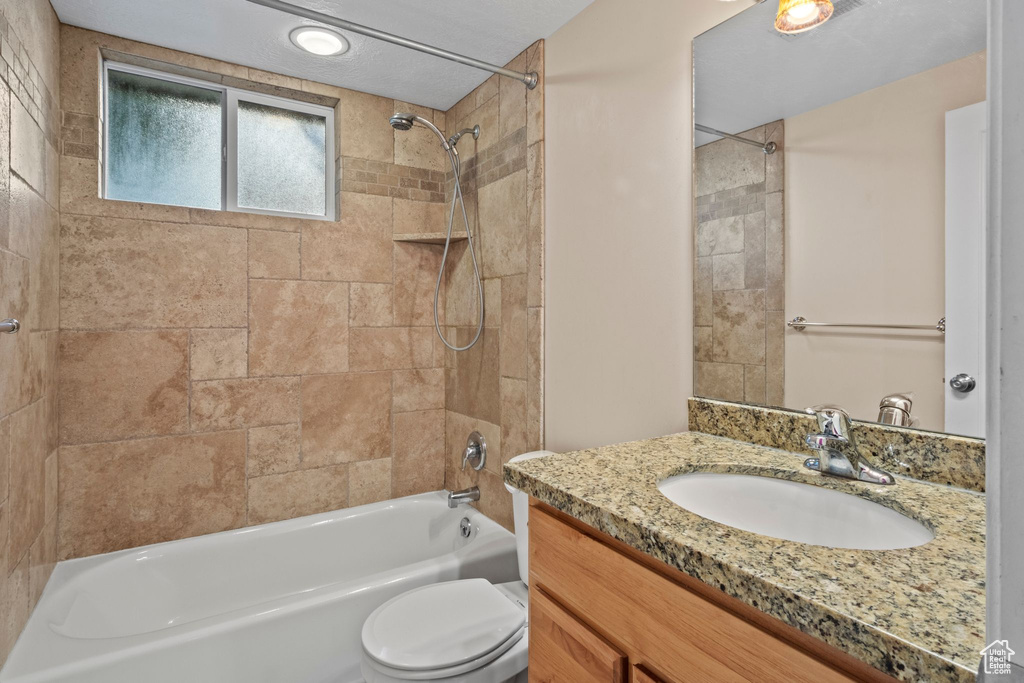 Full bathroom with vanity and shower / bathtub combination