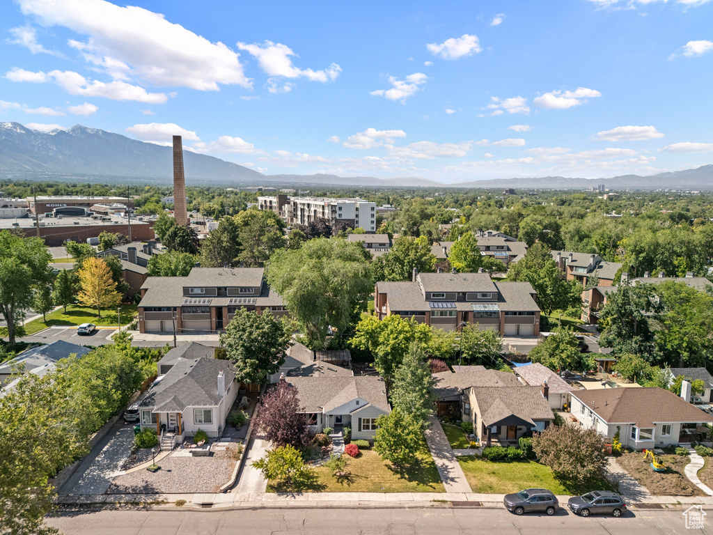 Aerial view of residential area featuring mountains
