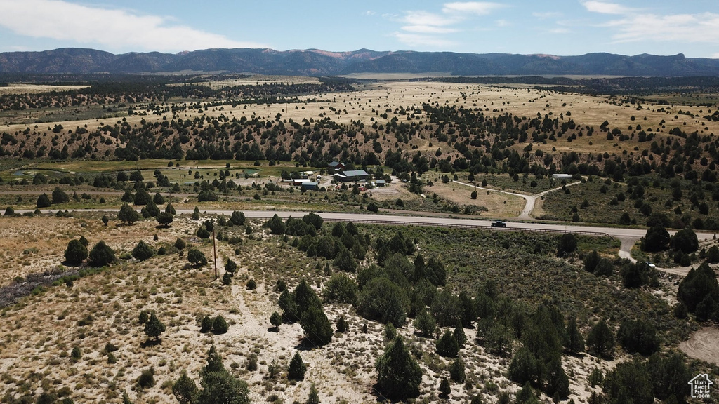View of mountain background featuring rural landscape