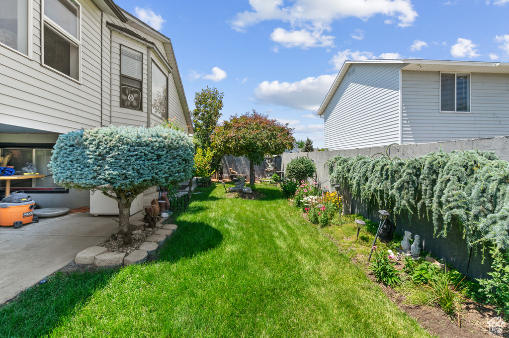 View of fenced backyard