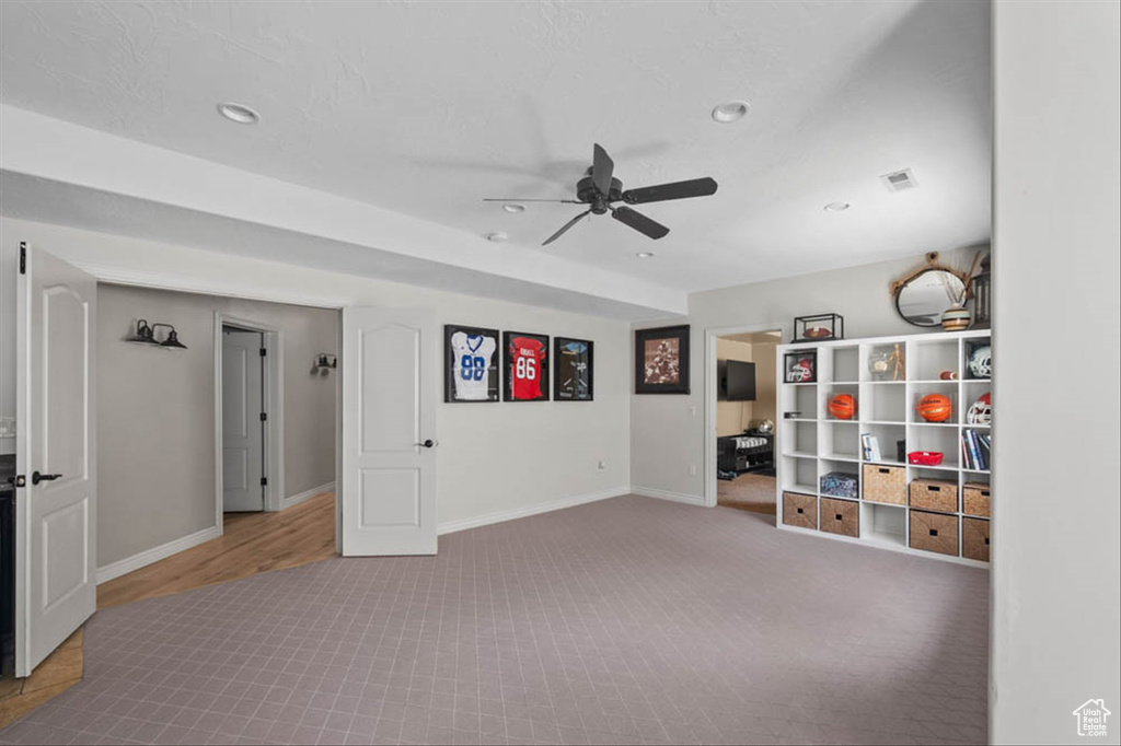 Game room with carpet, a ceiling fan, and recessed lighting
