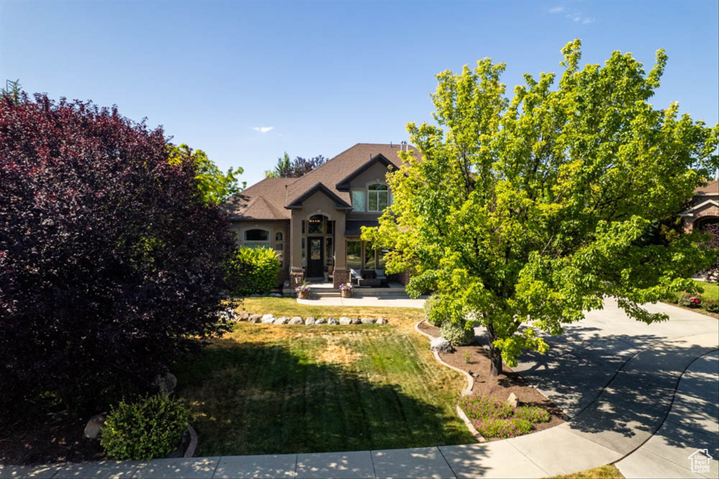 View of property hidden behind natural elements