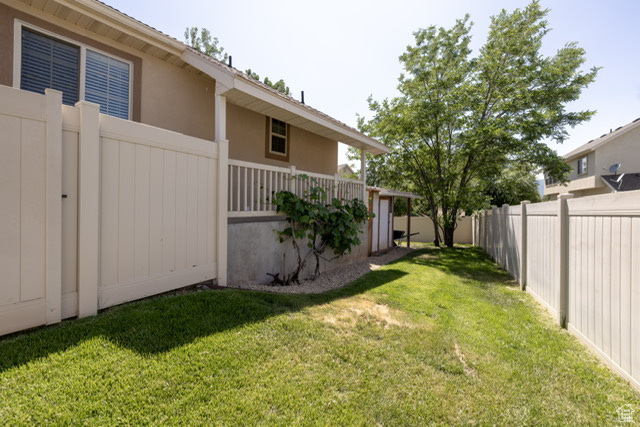 View of fenced backyard