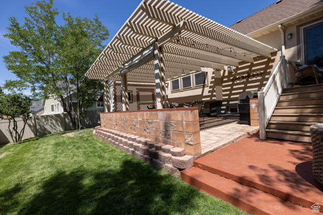 View of patio / terrace featuring area for grilling and a pergola