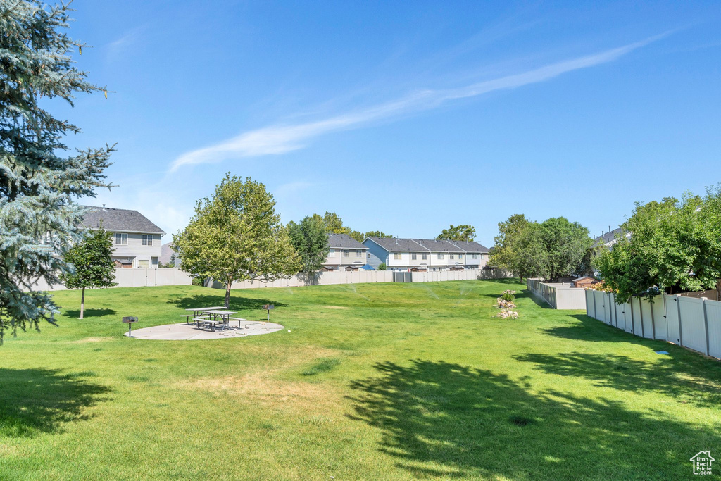 View of yard with a patio area and a residential view