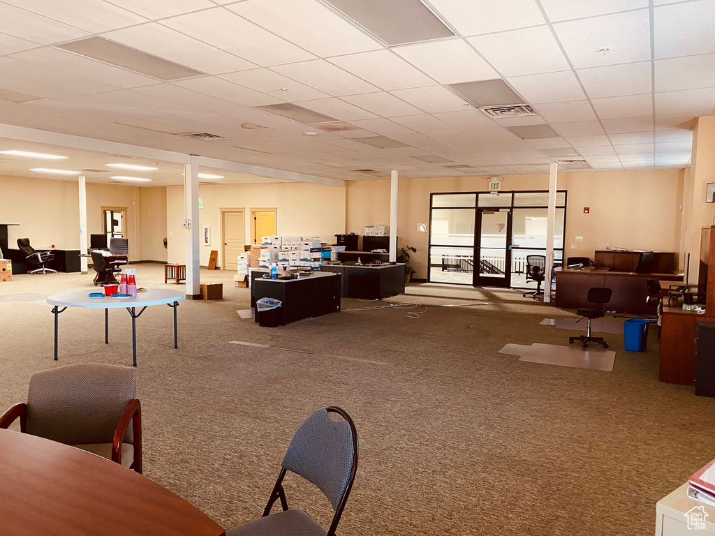 Recreation room featuring carpet and an office area