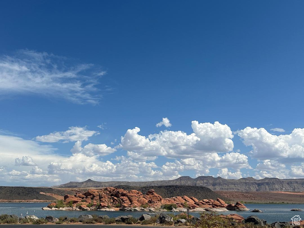 Mountain view featuring a large body of water