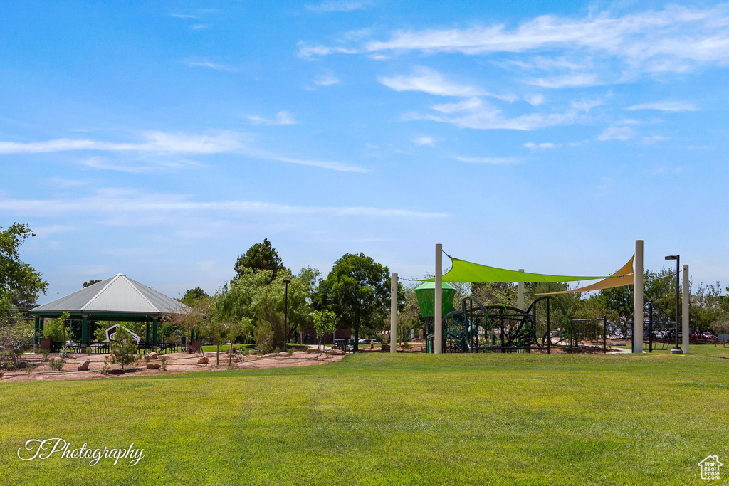 View of green lawn featuring a gazebo