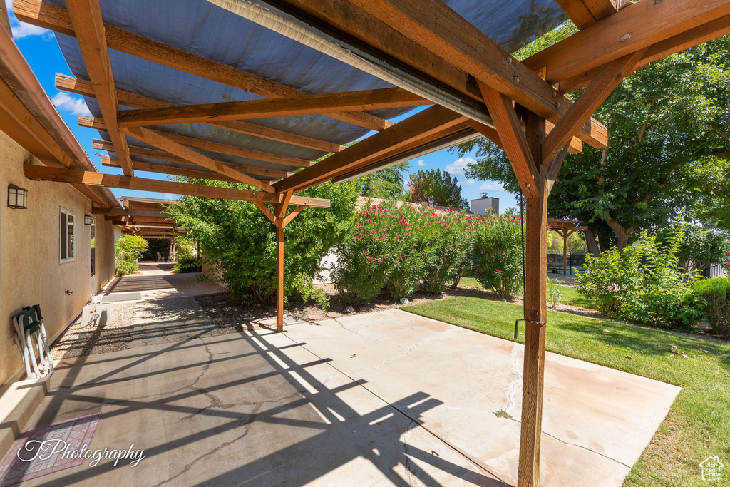 View of patio with a pergola