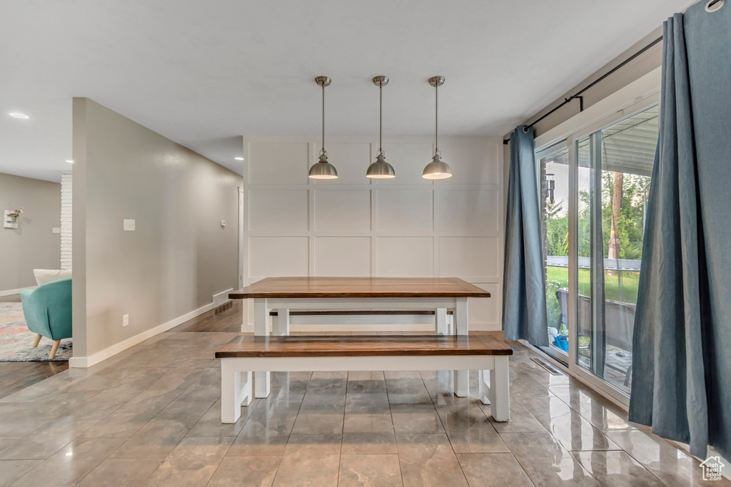 Unfurnished dining area with recessed lighting