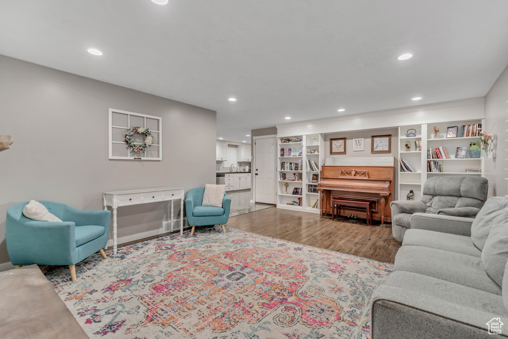 Living area featuring recessed lighting and wood finished floors